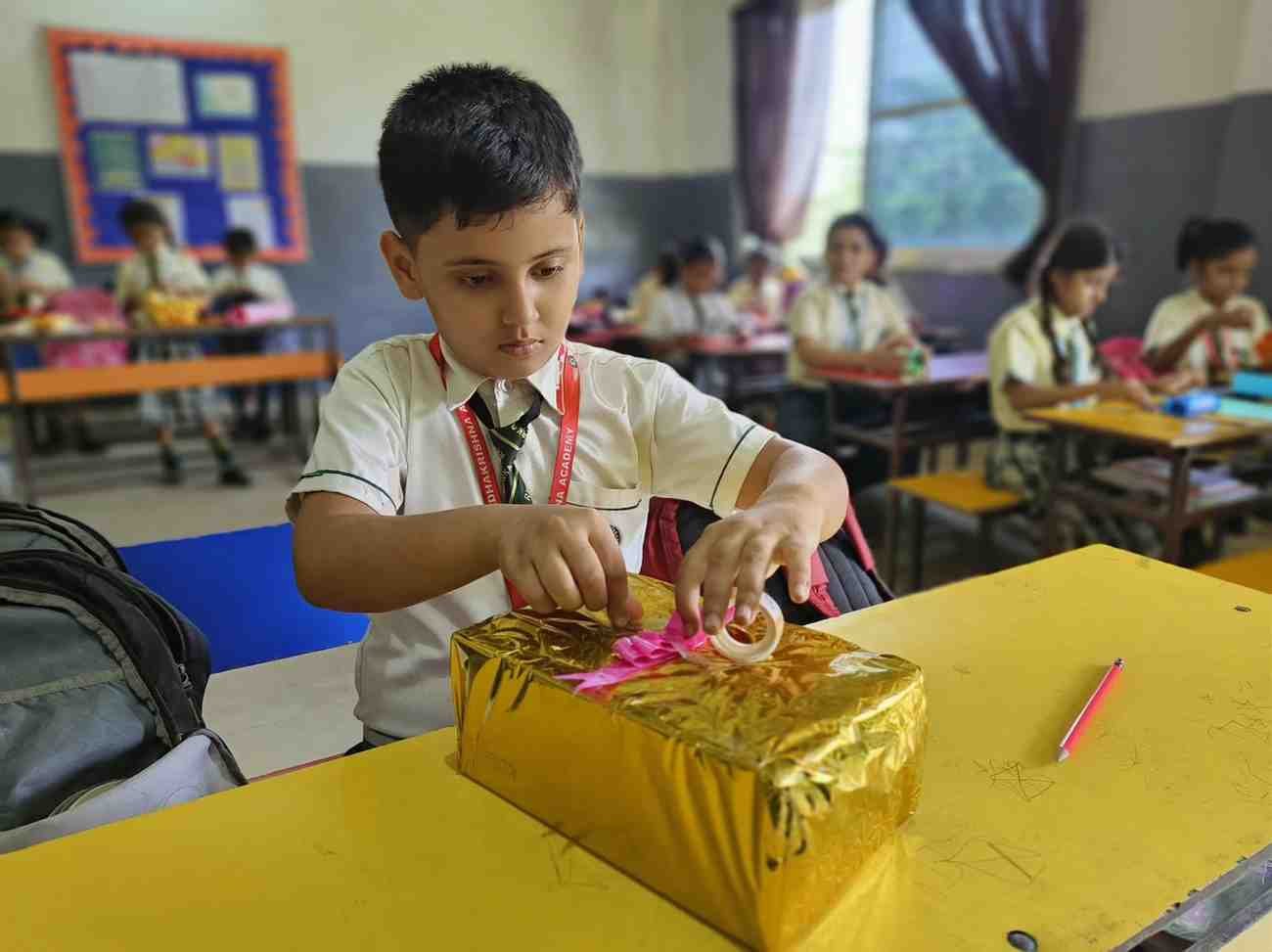 A student making a craft project